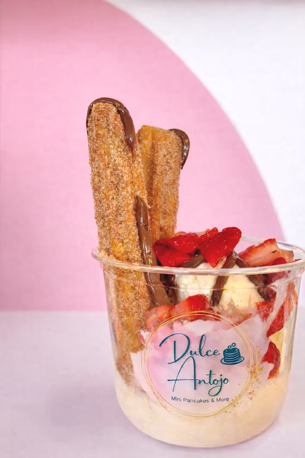 Churro sundae with strawberries